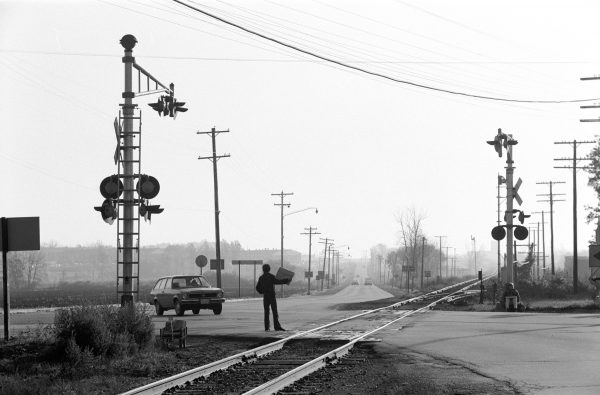 Railroad tracks continue to criss-cross the Milwaukee area, as revealed in this 1975 photograph of the intersection of Brown Deer Road and Highway 100.