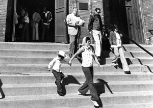 A group of parishioners exit Our Lady of Guadalupe after mass in 1975. 