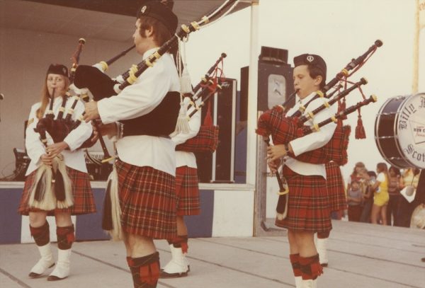 1973 photograph of the Billy Mitchell Scottish Pipe Band performing at Summerfest, showcasing the historic connection between Milwaukee's Scottish community and modern culture. 