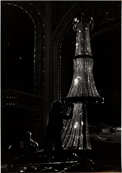 Hand stringing 33,000 inches of Austrian lead crystal for a chandelier in the Pabst Theater.
