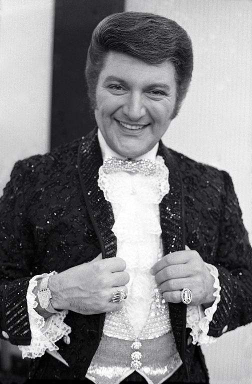Liberace poses for a photograph in 1968.