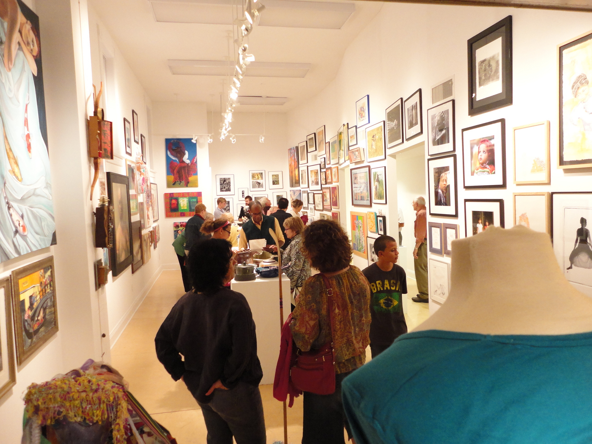 Visitors browse an art show opening at the Walker's Point Center for the Arts in 2011. 
