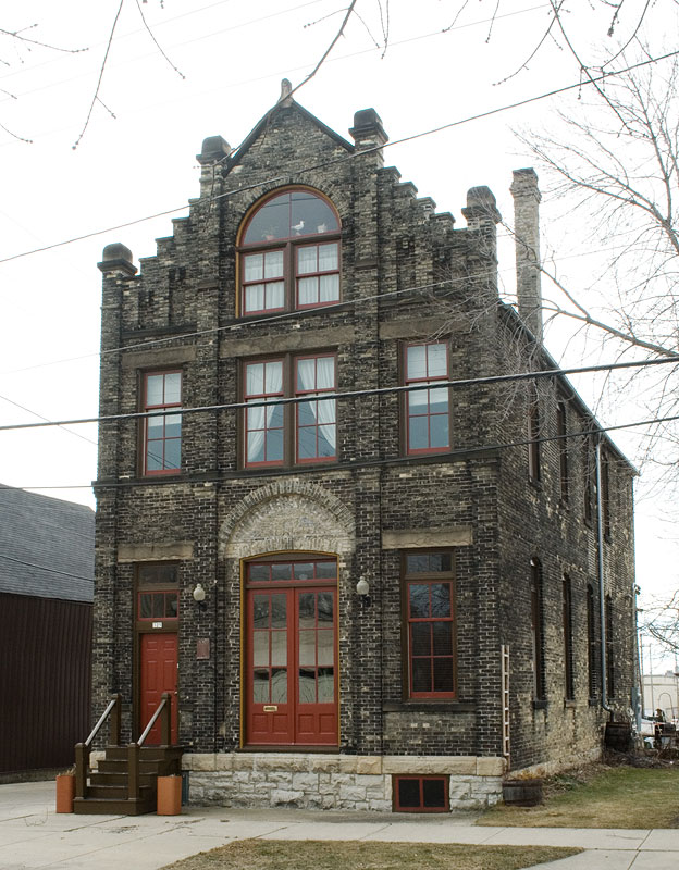The Frederick Ketter Warehouse, built around 1891, has housed a variety of manufacturing operations, including a horseradish and honey factory. Situated near the edge of Brewer's Hill and Halyard Park, the building has been claimed by both communities throughout its history. 