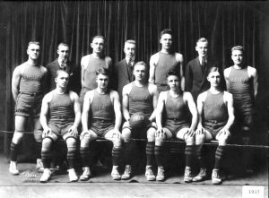 Team photograph of the Marquette University men's basketball squad from 1917. 