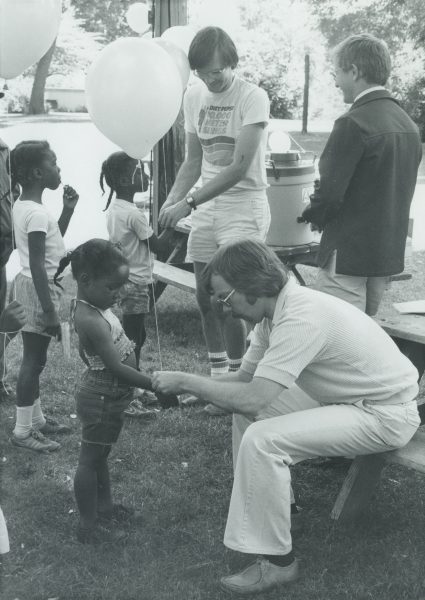 Participants in a street festival run by the Midtown Neighborhood Association in May 1985.