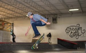 A skateboarder is caught mid-flip at Cream City Skate Park, an indoor facility in Butler. 