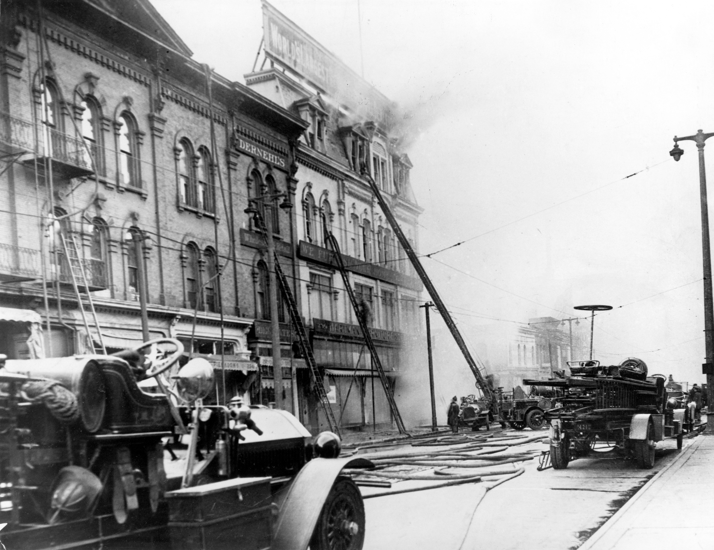 Firefighters battle a blaze at the Hartman Furniture store in June 1926. The fire was so large that 150 firefighters were needed to combat it.
