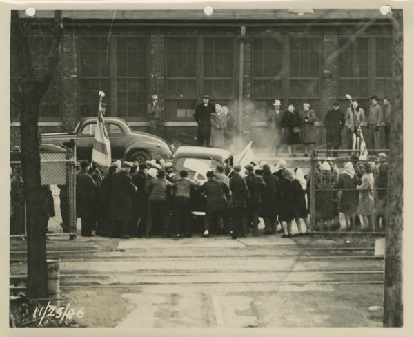Picketers try to prevent a car from entering the Allis-Chalmers factory, November 25, 1946.  United Auto Workers Local 248 waged a 13-month strike against the company from April 1946 to May 1947.  This picture was in company testimony before the U.S. House of Representatives Committee on Education and Labor, February 24, 1947, alleging the union was dominated by Communists. 