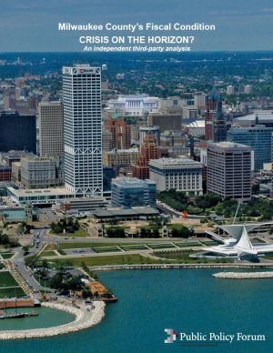 Photograph of Milwaukee city landscape in the background and the Milwaukee Art Museum along with the lakefront area in the foreground. The text on the top center of the image reads, "Milwaukee County's Fiscal Condition, Crisis on the Horizon? An independent third-party analysis." The text at the bottom right corner reads "Public Policy Forum."