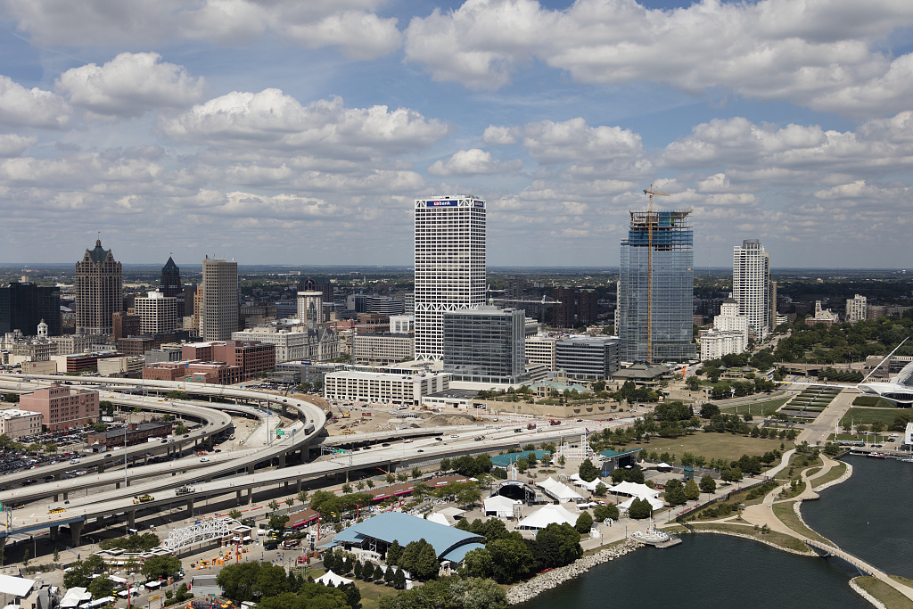 The newest Northwest Mutual Company building is under construction in this 2016 aerial photograph of Milwaukee's downtown. The Henry Maier Festival Park along Lake Michigan is in the foreground. 
