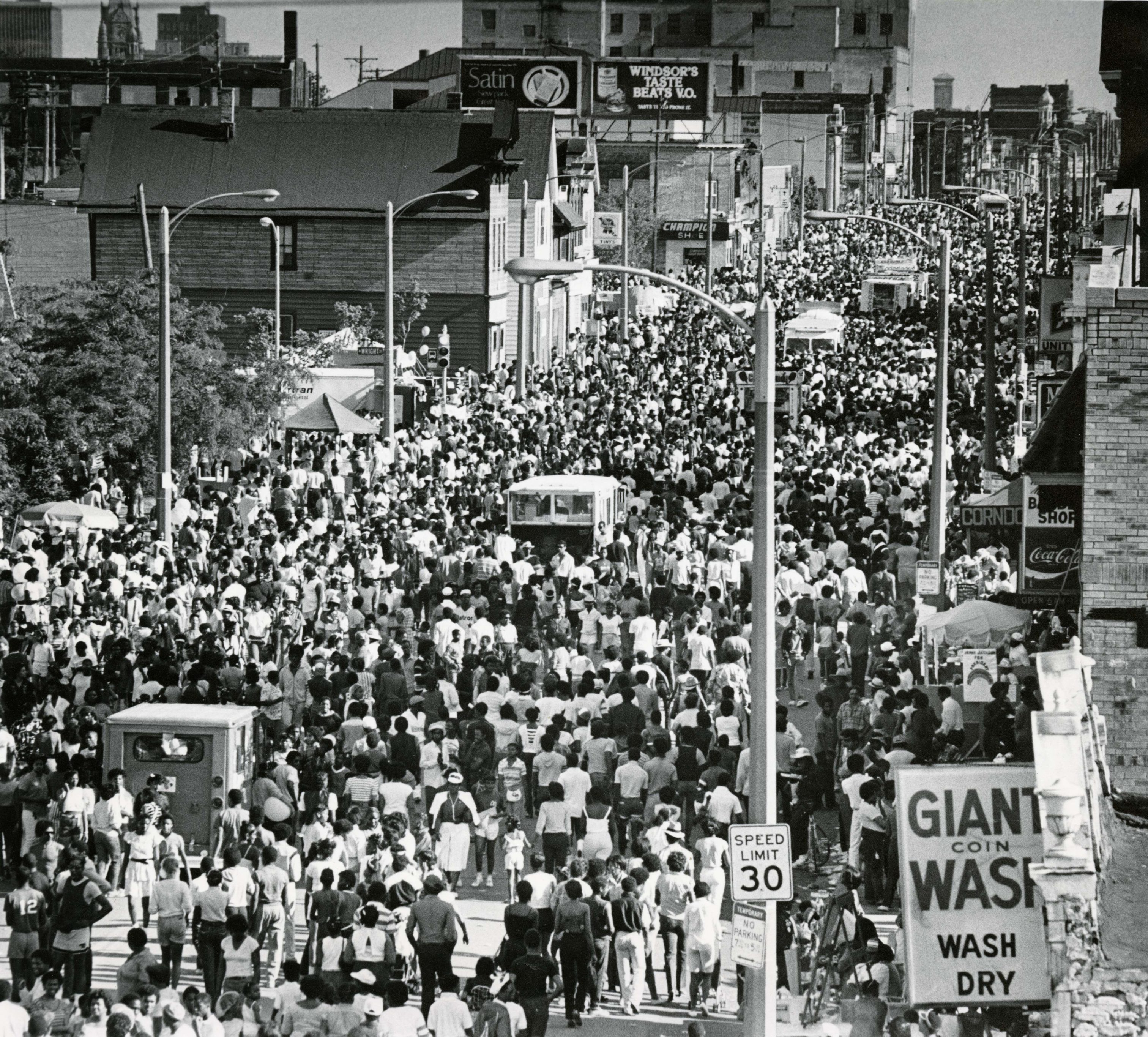 Crowds fill the street for a Juneteenth Day celebration in 1984. Juneteenth Day is observed on June 19th and commemorates the formal end of slavery in the United States. 