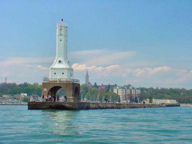 This 2006 view from Lake Michigan features the Port Washington port light with the city in the background.