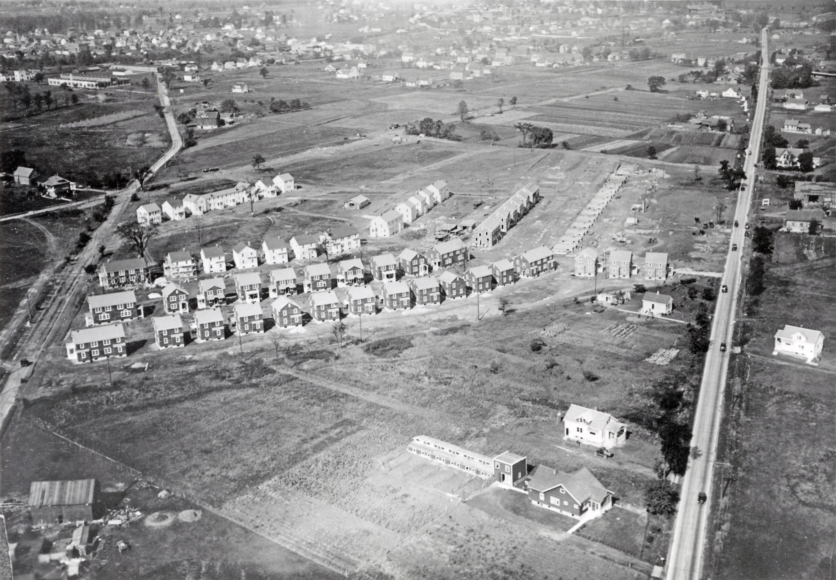 The Garden Homes housing development was the first municipally-sponsored public housing project in the United States. This 1922 aerial photograph provides a view of the neatly laid out homes just before they were completed in 1923.