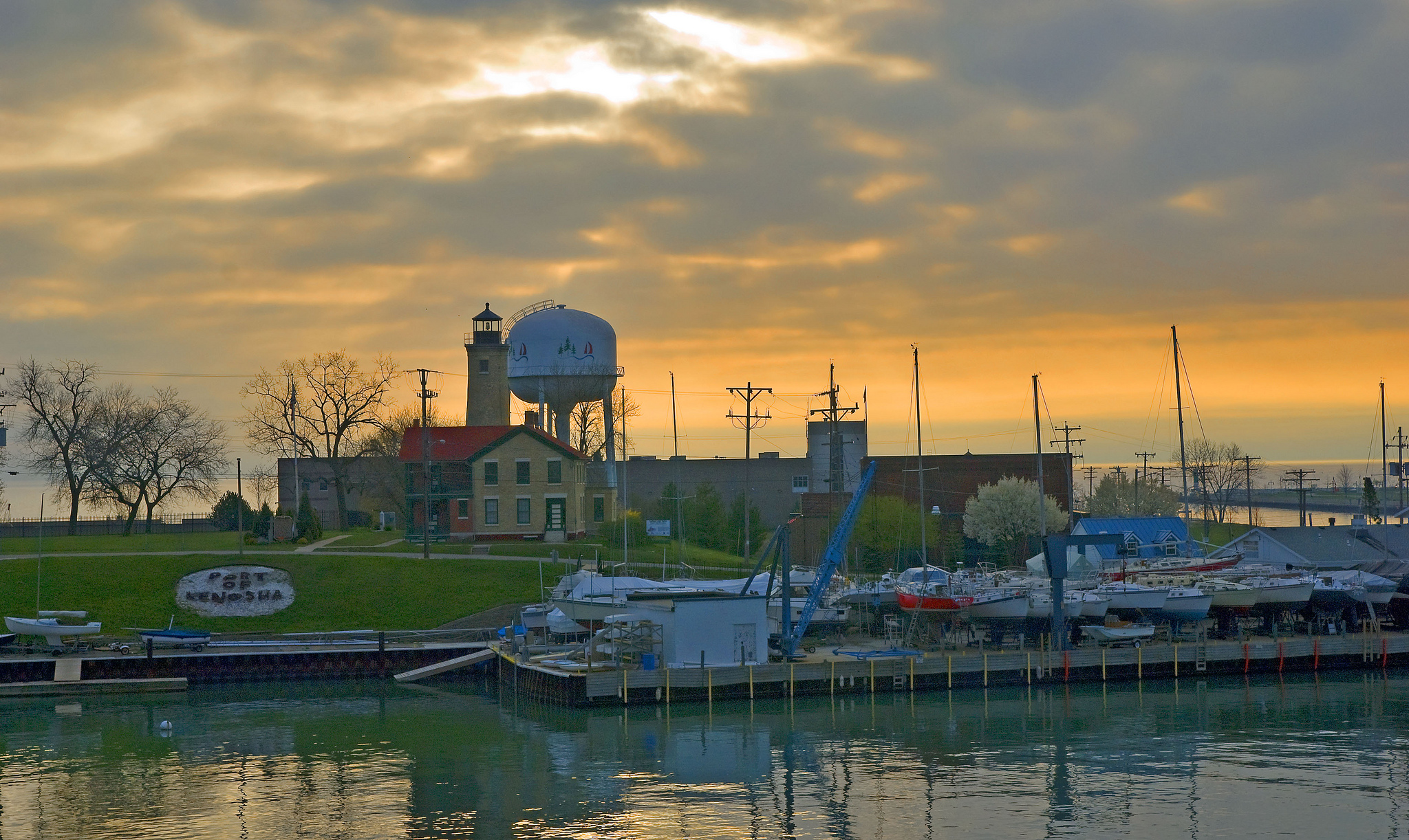 Pictured here in 2012, the Port of Kenosha sits along Lake Michigan. Its historic light station is seen in the middle ground of the photograph.