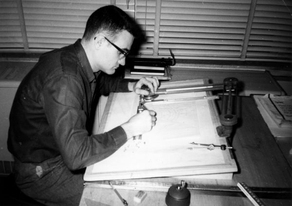A student at Waukesha County Technical College works at a small drafting table in this photograph from 1950.