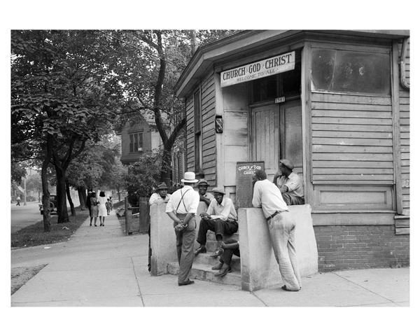 A group of parishioners gather on the steps of New Fellowship Church of God in Christ in 1939. The church was located on N. 8th Street. 