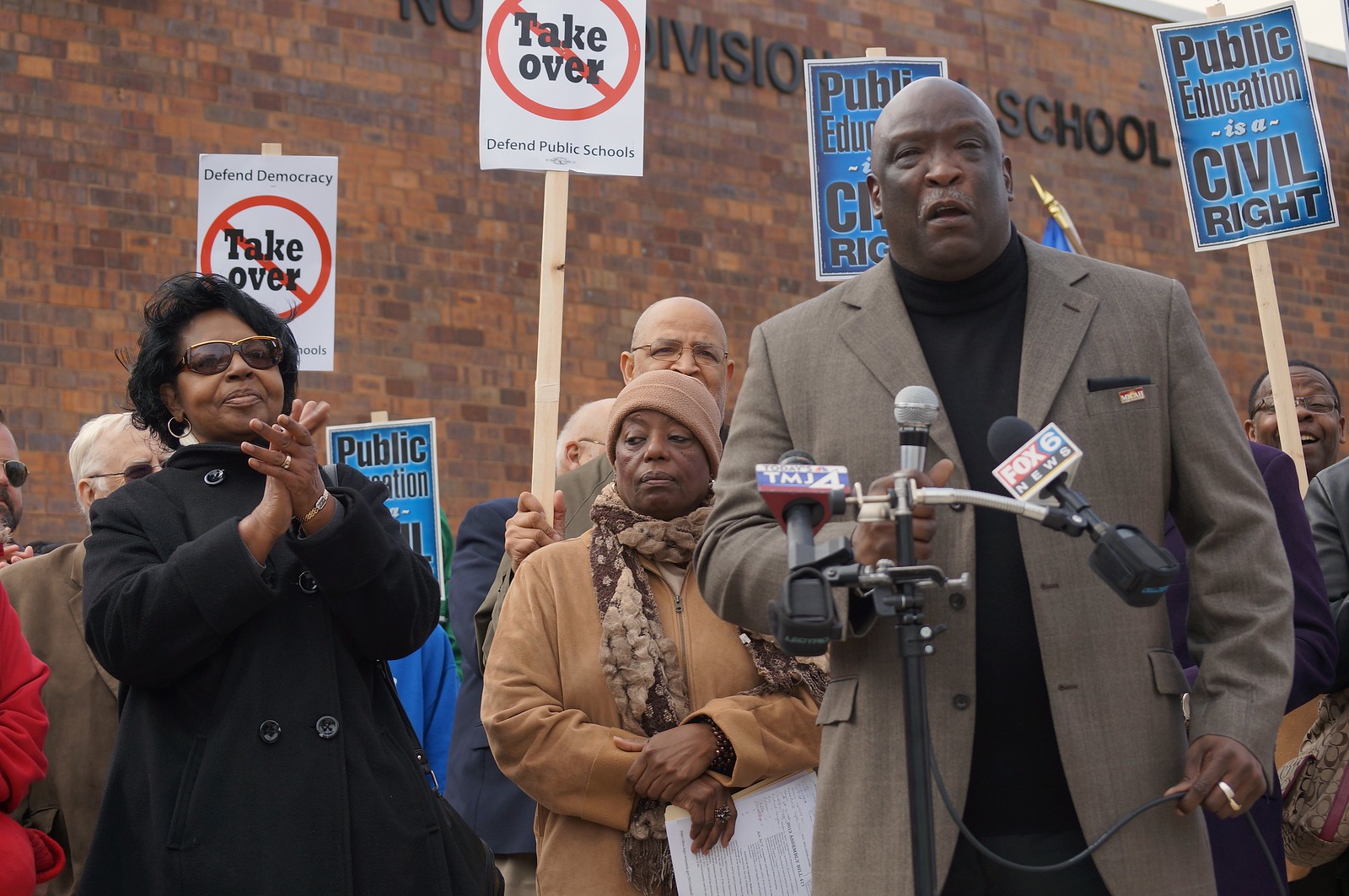 Rev. Willie Brisco addresses the media in 2013 to express opposition to legislation that would have required MPS to sell buildings to private companies. Rev. Brisco has served as president of both MICAH and WISDOM.