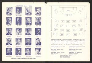 A page highlights headshots of 20 alderpersons from 1960-1964 displayed in a 4 by 5 grid. Vel Phillips's photo is on the second row first column. Their seating arrangement and committee meeting schedules are on the adjoining page on the right.