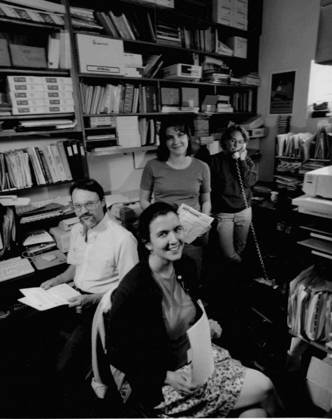 In its early years, Rethinking Schools was headquartered in a small office of the Milwaukee Peace Action Center. Pictured from the foreground to background are Jennifer Morales, Mike Trokan, Sharon Matthias, and Barbara Miner. 